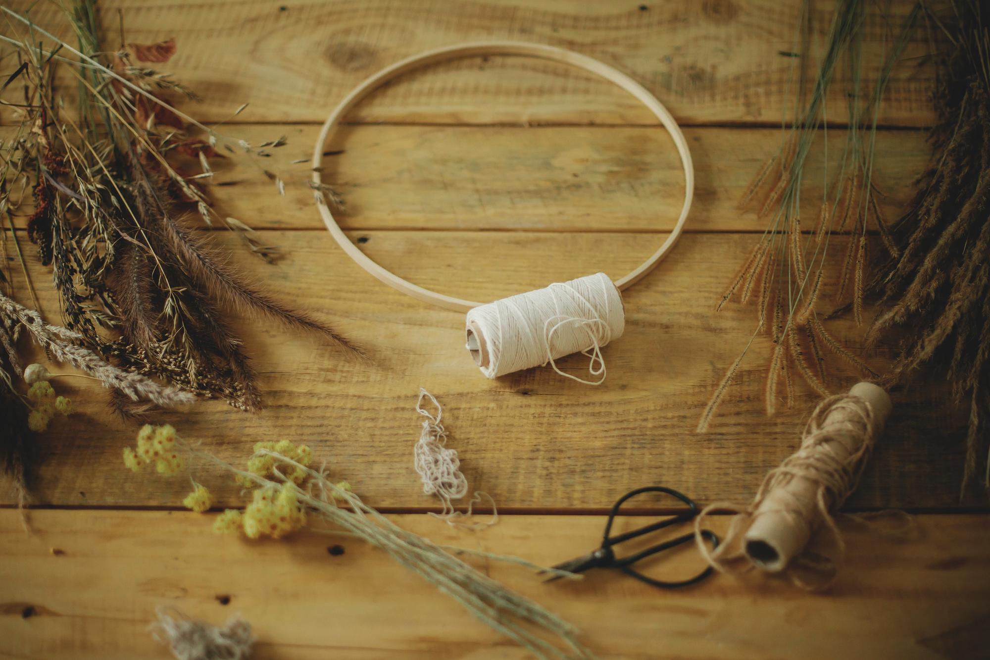Interior of embroidery atelier with threads and hoop